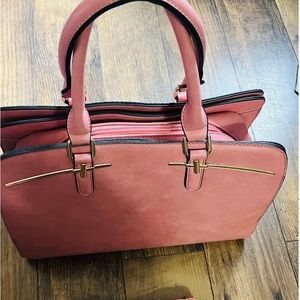 Large shoulder bag with removable strap.